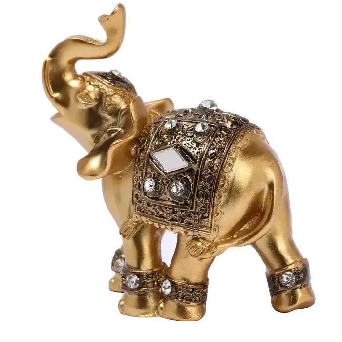 Statue d'éléphant en résine dorée