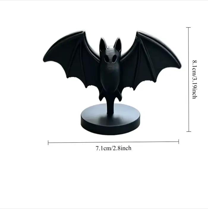 Figurine de chauve-souris noire