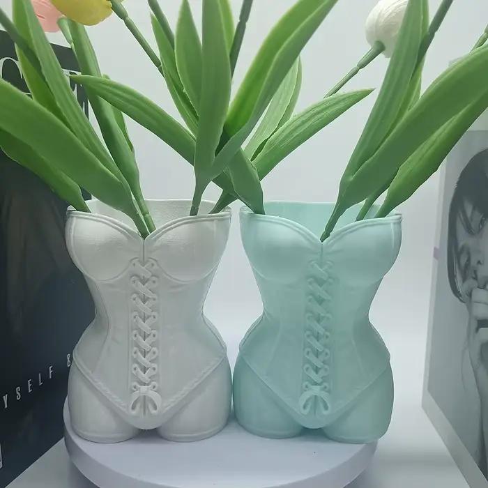 Vases en forme humaine