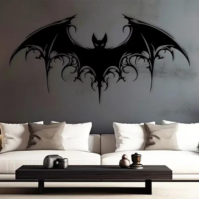 Sculpture murale en métal noir en forme de chauve-souris