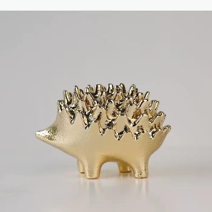 Sculpture d'hérisson doré moderne en métal pour décoration de bureau et maison, idéale pour améliorer l'environnement de travail et la décoration intérieure