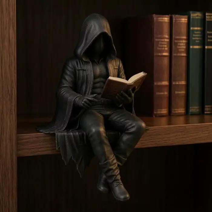 Figurine homme en robe assis