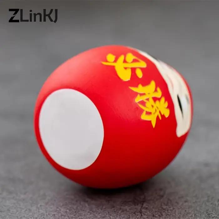 Poupée Daruma en céramique japonaise