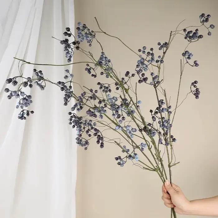 Branche de fleurs de fruits de baies de Noël