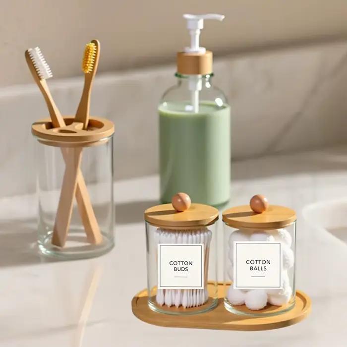 Ensemble d'accessoires de salle de bain en bambou, avec plateau, distributeur de savon en plastique, porte-brosse à dents transparent et 2 supports Qtip, boule de coton, 5 paquets