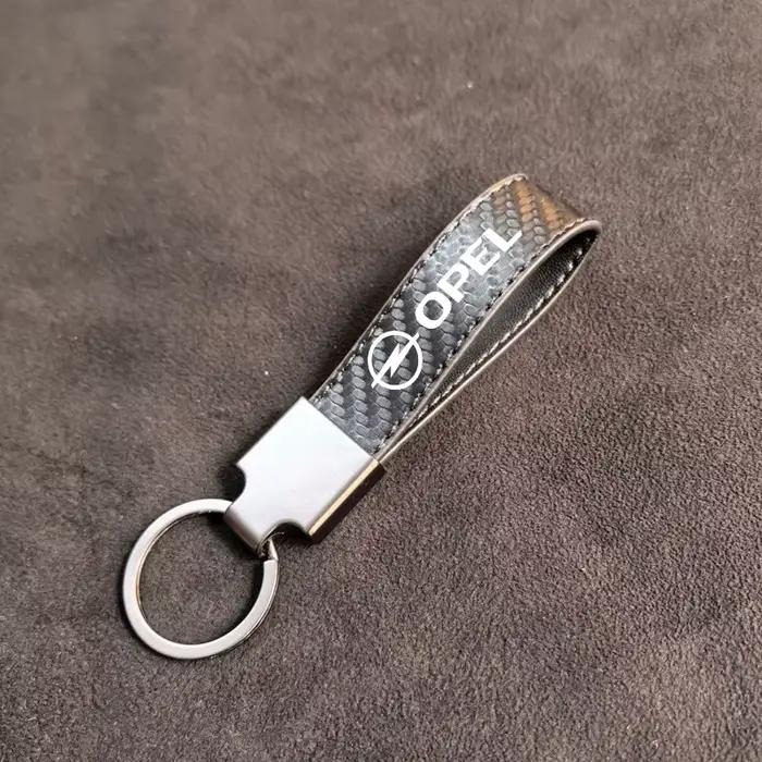 Porte-clés en Fiber de carbone, emblème Opel haut de gamme, pendentif, cadeaux pour Opel Corsa D Astra Insignia Combo OPC, accessoires Vauxhall
