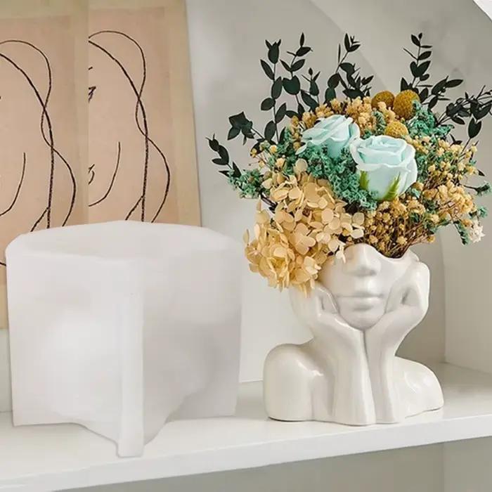 Pot de jardinière de visage abstrait