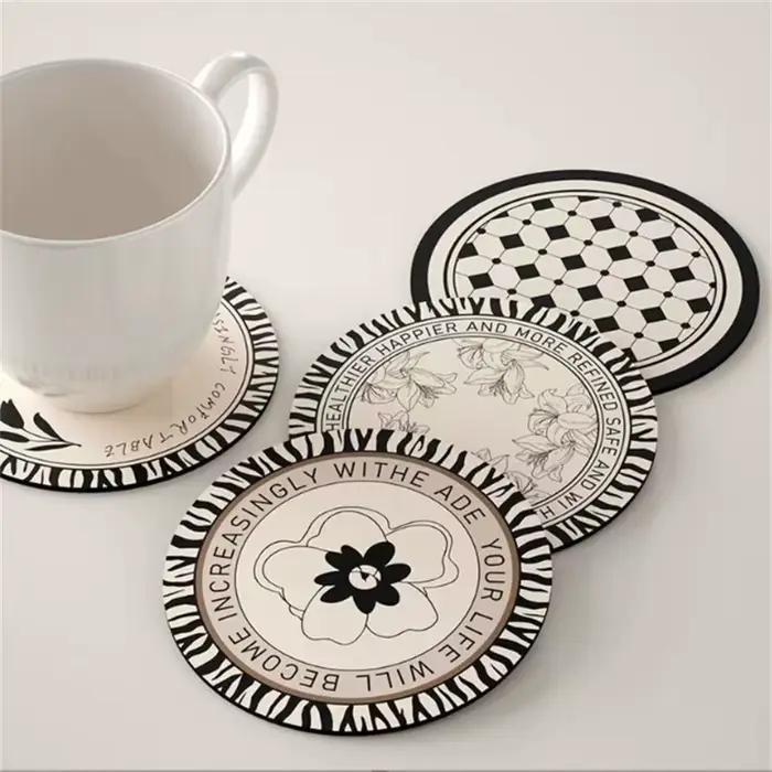 Sets de table isolants en terre de diatomée design rétro noir et blanc pour une décoration intérieure élégante et durable