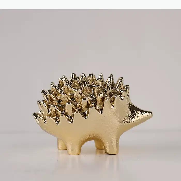 Sculpture d'hérisson doré moderne en métal pour décoration de bureau et maison, idéale pour améliorer l'environnement de travail et la décoration intérieure
