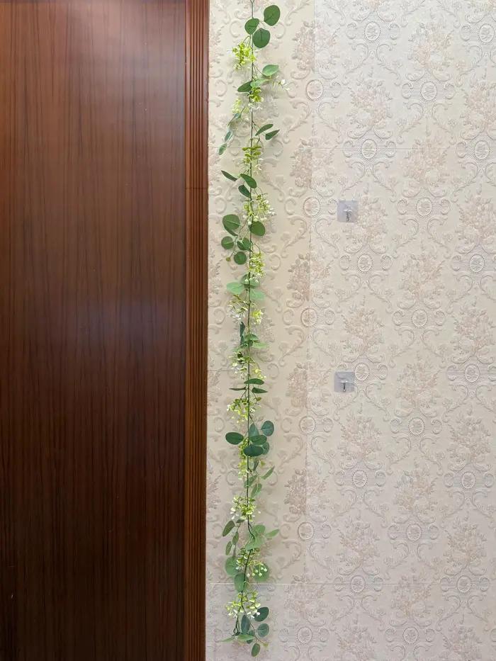 Guirlande de feuilles d'eucalyptus artificielles 1/2