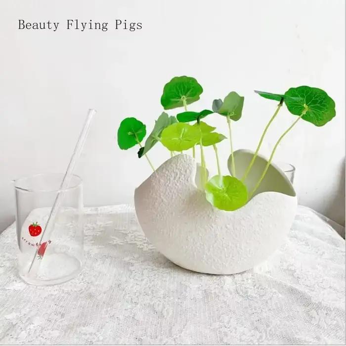 Vase en céramique blanche de style nordique pastChevmoderne