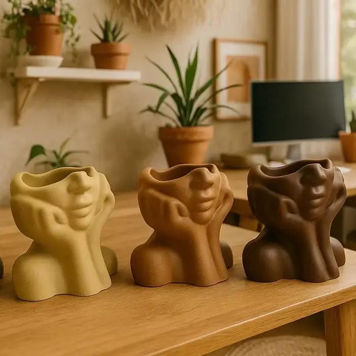 Pot de jardinière de visage abstrait