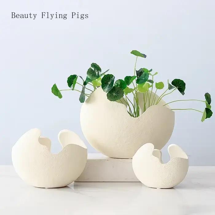 Vase en céramique blanche de style nordique pastChevmoderne