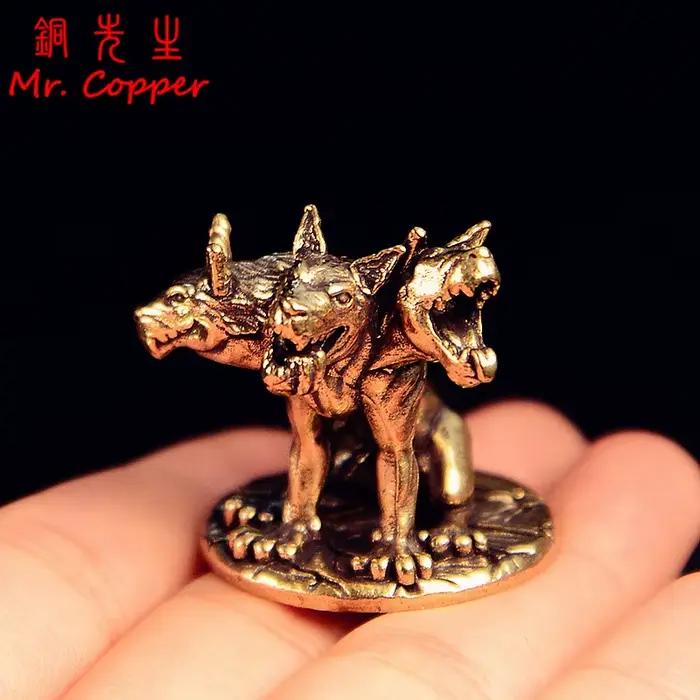 Figurines miniatures de chien à trois têtes en laiton