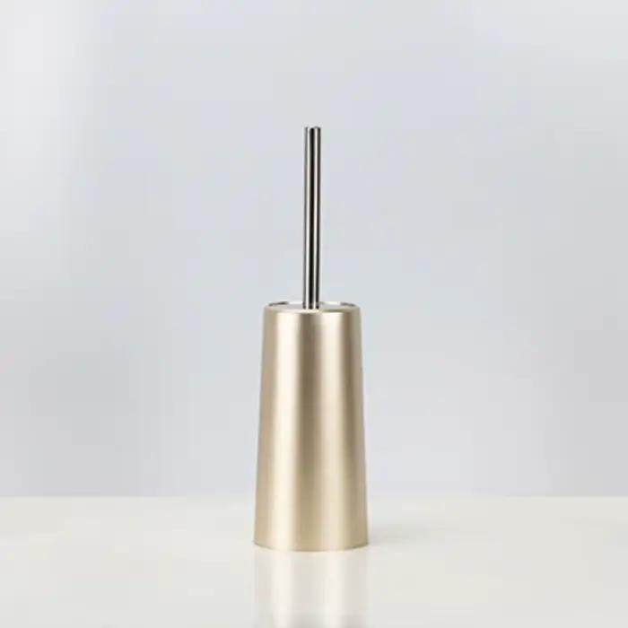 Brosse de toilette dorée avec support