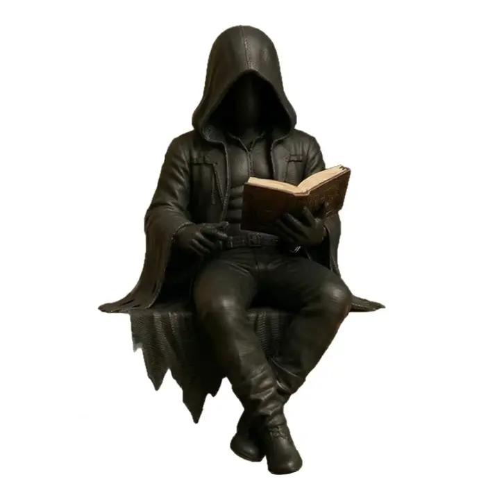 Figurine homme en robe assis