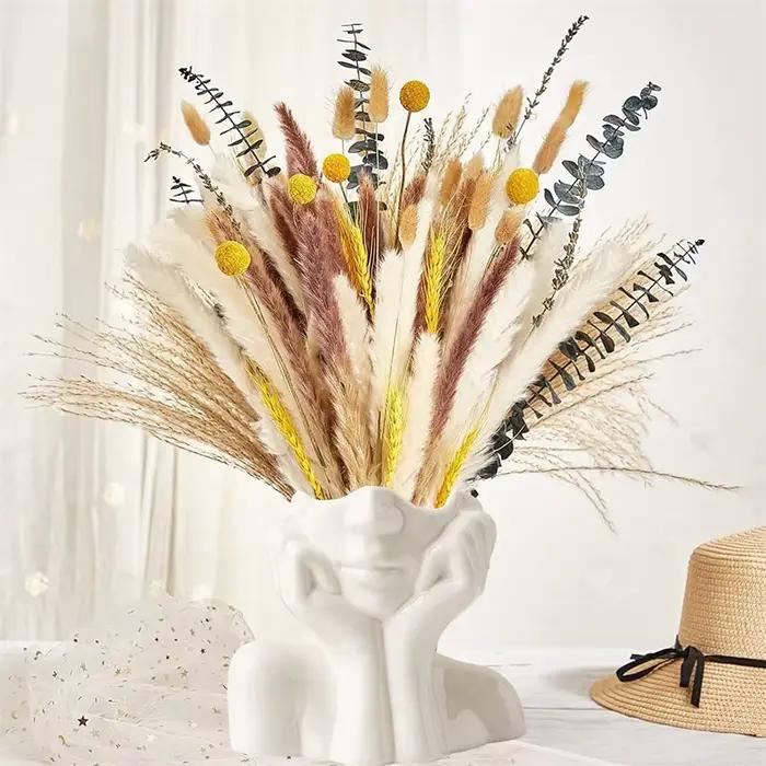 Pot de jardinière de visage abstrait