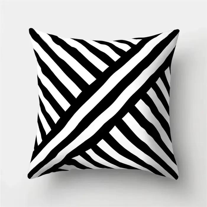 Housse de coussin géométrique noir et blanc