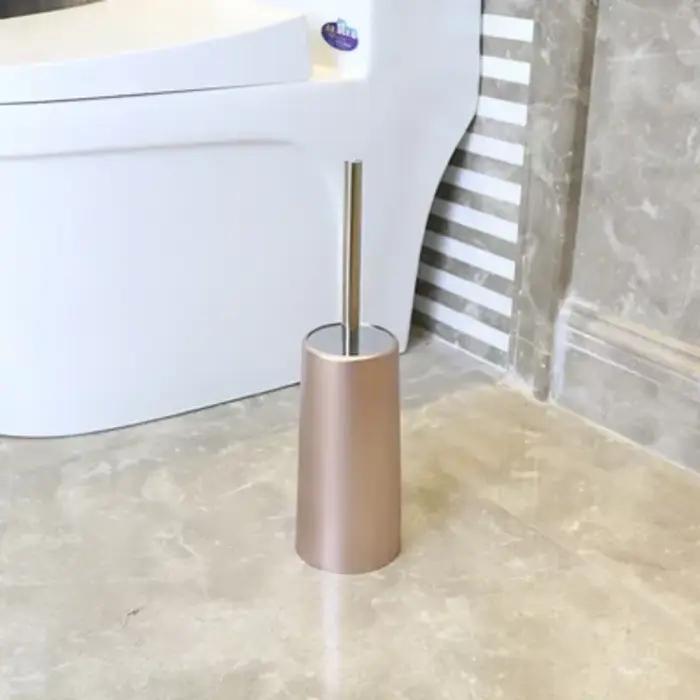 Brosse de toilette dorée avec support
