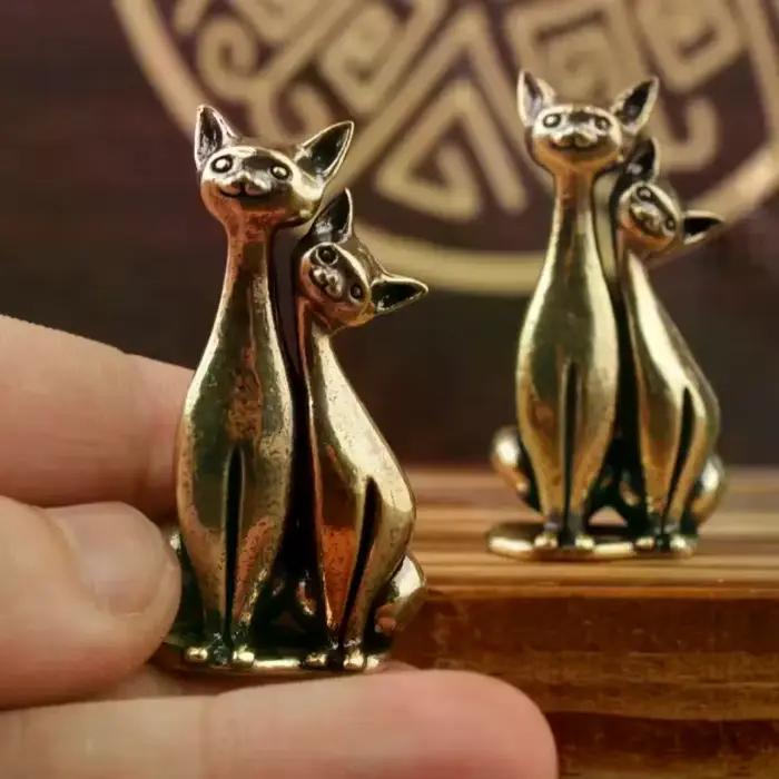 Sculpture de chat double en laiton