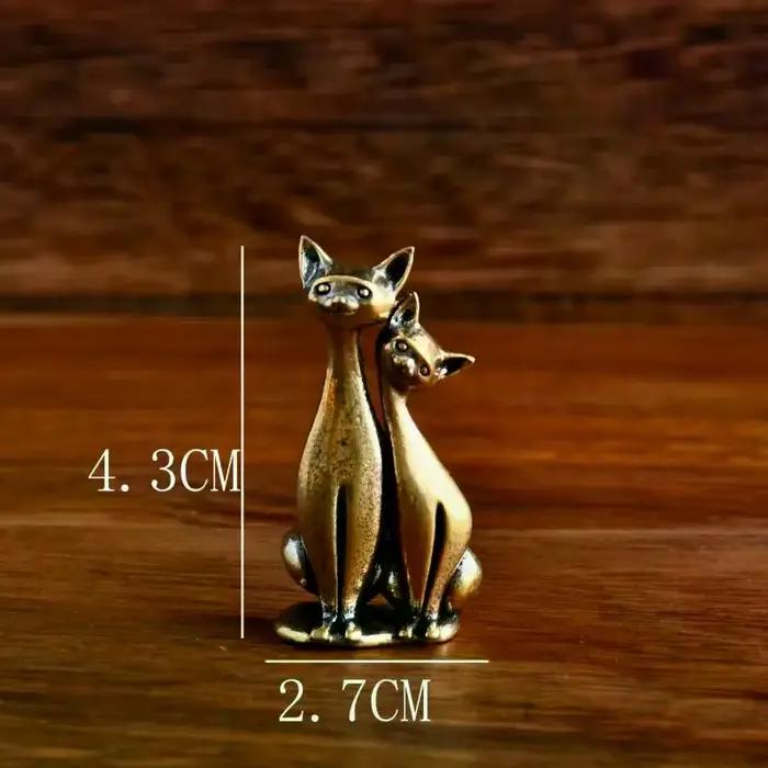 Sculpture de chat double en laiton