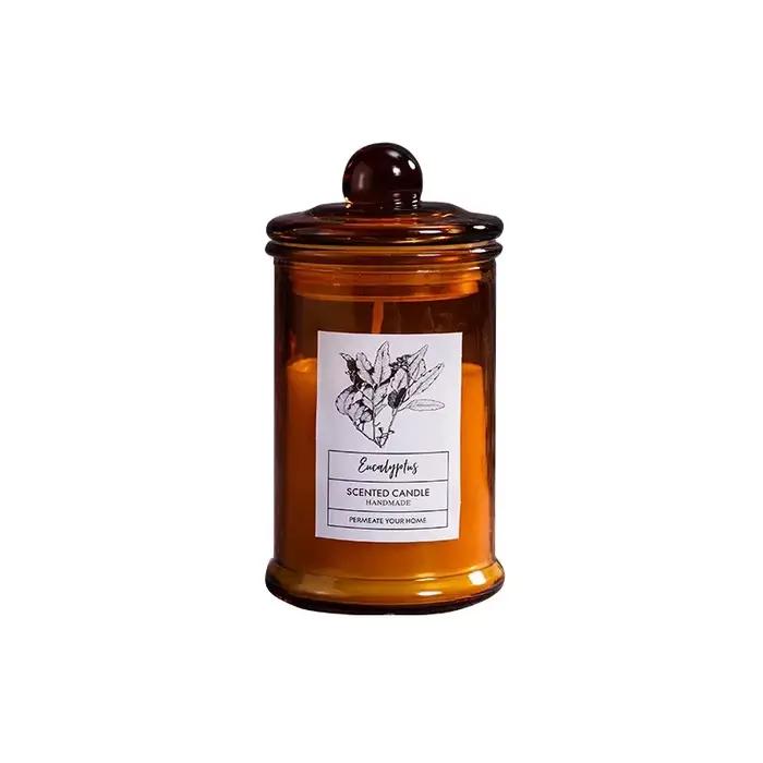 Pot en verre vintage avec bougie parfumée et huiles essentielles pour la maison et les occasions spéciales