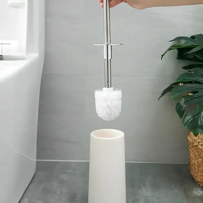 Brosse de toilette dorée avec support