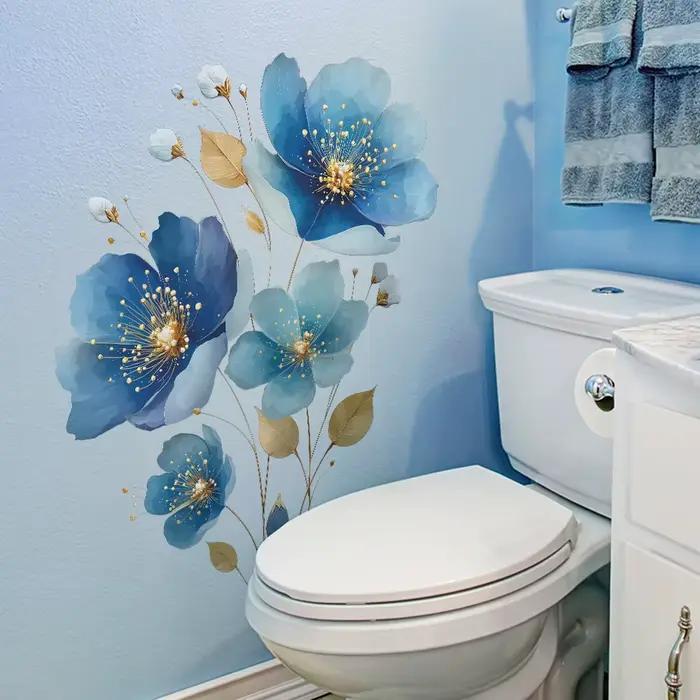Autocollant mural floral bleu doré.