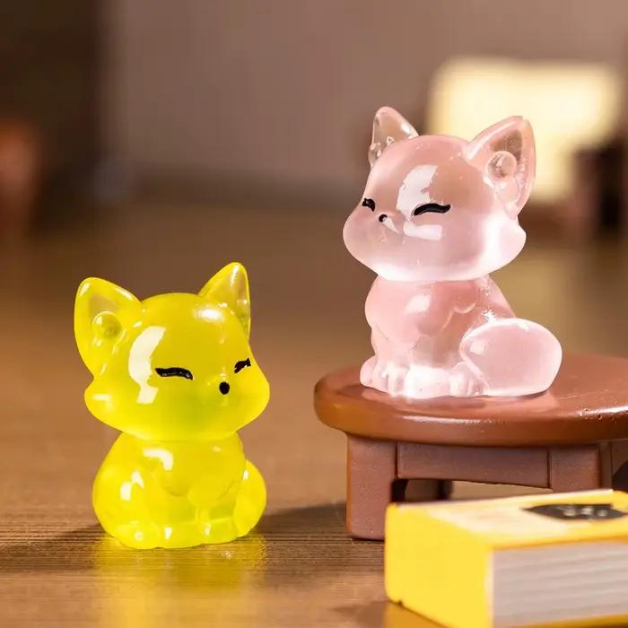 Figurines de renard lumineux en résine