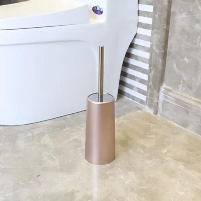 Brosse de toilette dorée avec support