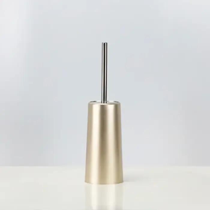 Brosse de toilette dorée avec support