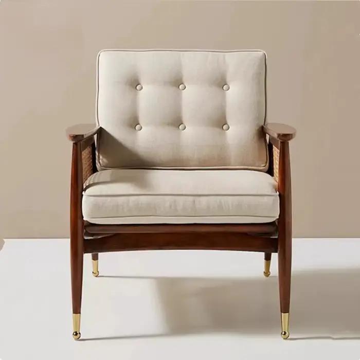 Fauteuil Vintage en rotin avec soutien lombaire