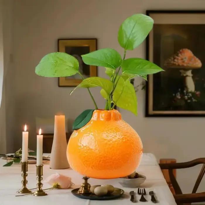 Décoration de table créative avec vase en forme de fruit orange