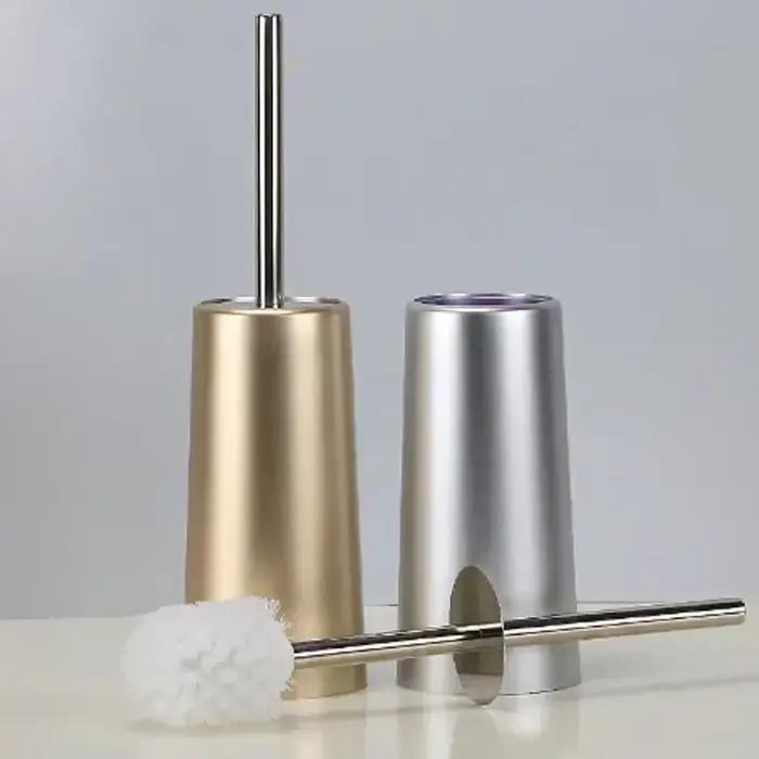 Brosse de toilette dorée avec support