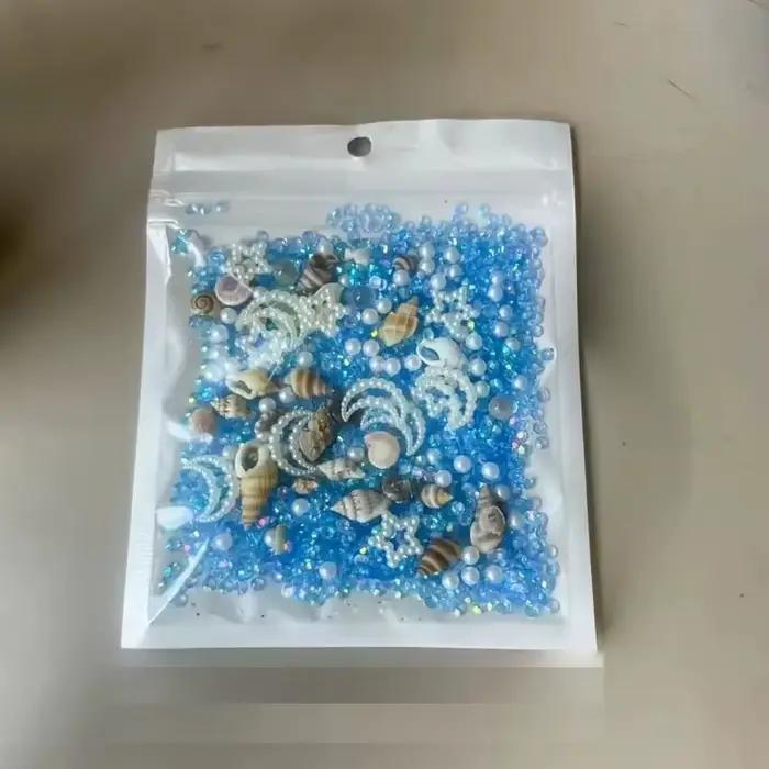 30 g de remplissage en résine époxy sur le thème de l'océan - Formes d'étoile