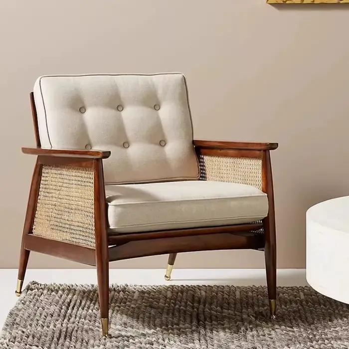 Fauteuil Vintage en rotin avec soutien lombaire