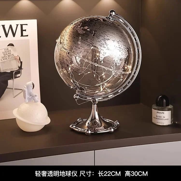 Ornement globe moderne de luxe avec accent bateau à voile, sculpture métallique élégante pour salon,